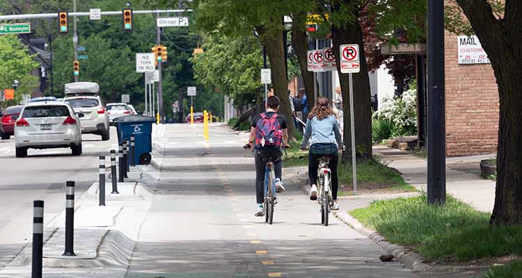 Bikers on Division street in Ann Arbor